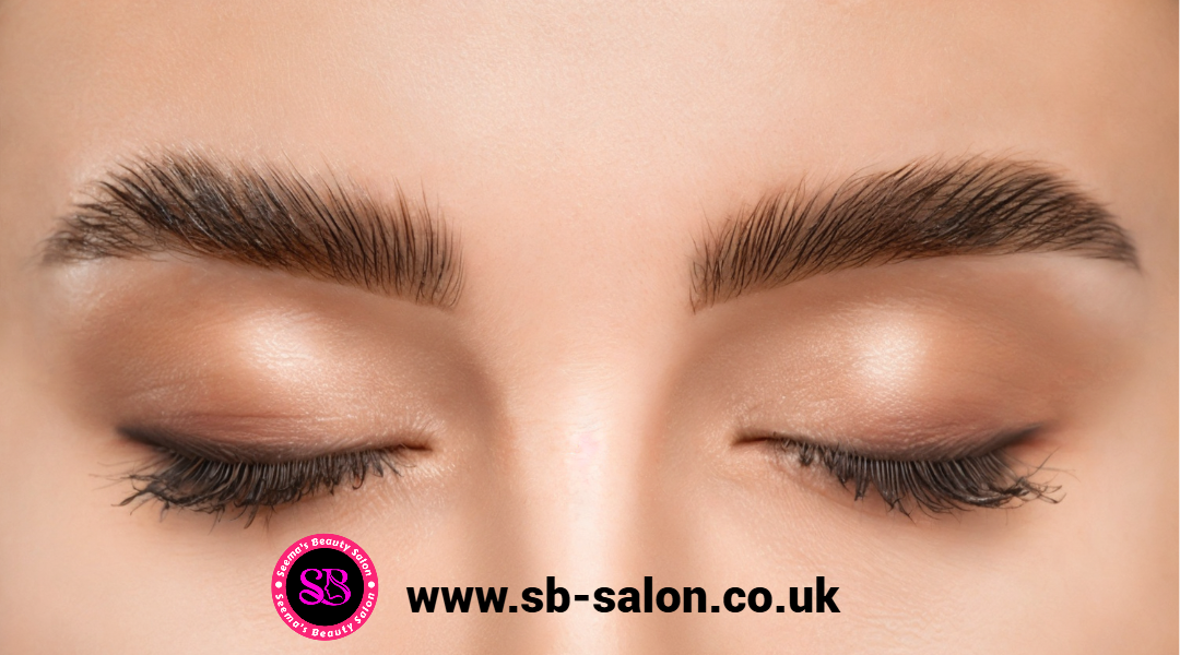 "Close-up of laminated and tinted eyebrows on a woman with closed eyes, showing full, lifted brow results from Seema’s Beauty Salon, Totton – www.sb-salon.co.uk."